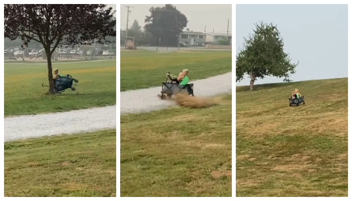 video of a father laughing at his children coming down from the top of a hill in a toy cart and crashing into a tree has gone viral on social media 