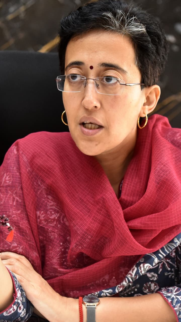 Why did Delhi's CM Atishi drop her second name 'Marlena'?