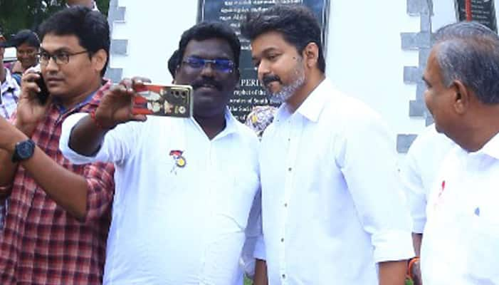 TVK leader Thalapathy vijay paid respect for periyar DMK worker took selfie ans