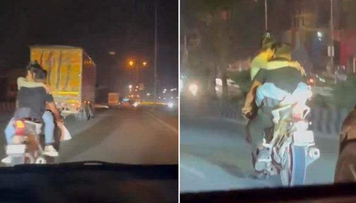 Couple romance on bike in delhi busy road video viral mrq