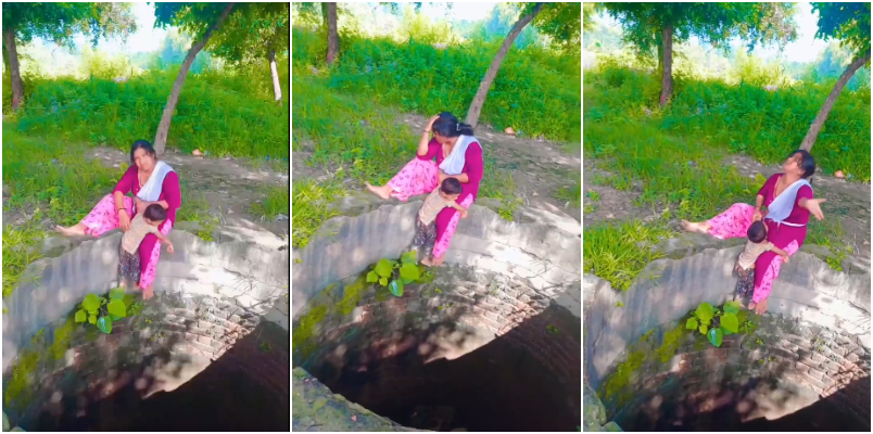 Woman Dangerous Video Shoot With Child At One Hand On The Edge Of Open Well