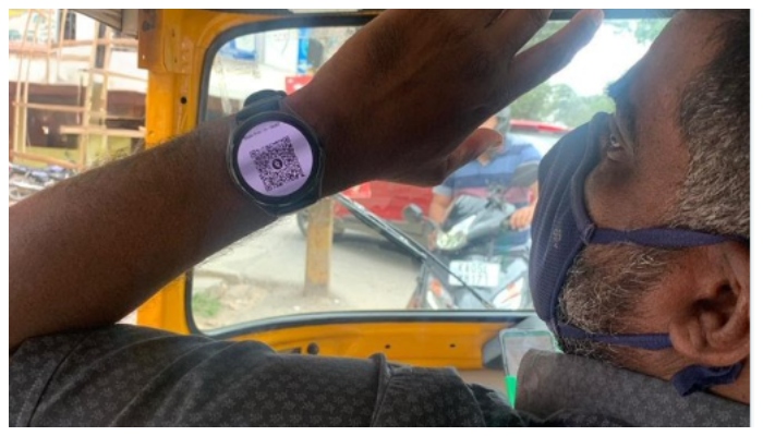 Auto driver s picture showing QR code on smartwatch goes viral 