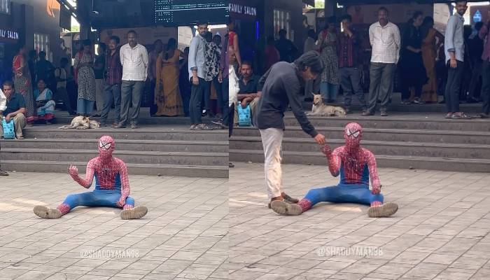 man dresses as spider man begging in front of Kalyan station in Maharashtra 