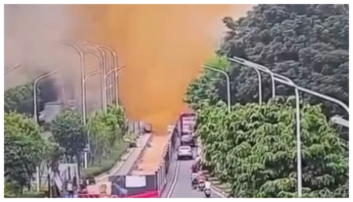 video of a Sewage pipe explodes at a height of two buildings Sewage waiste covered vehicles passing by the road went viral  