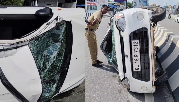 accident in Kazhakoottam Elevated Highway car went out of control after hitting the divider and overturned; One injured in the accident