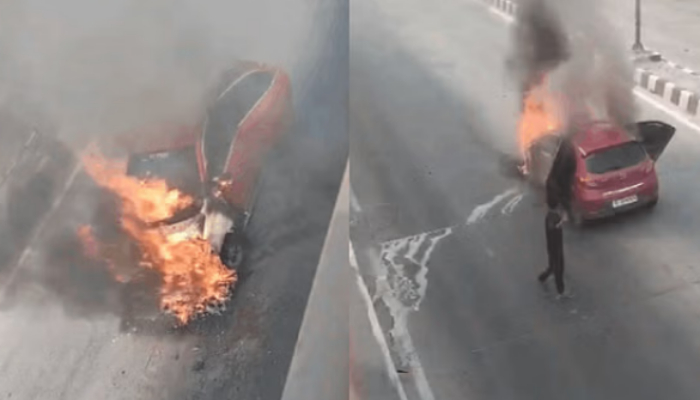 A red color car catches fire near Dwarka underpass Delhi video viral