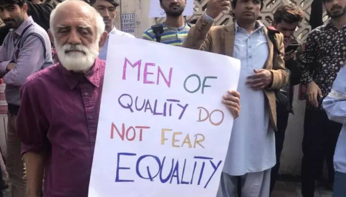 Men of quality do not fear equality man at Pakistans womans march viral image 