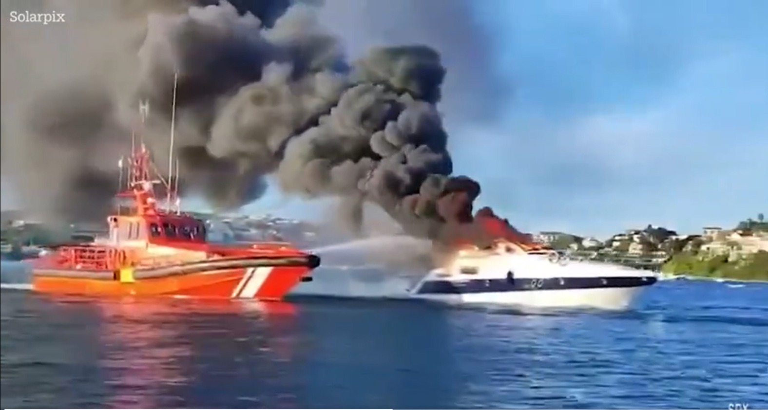 Dramatic rescue of 4 Britons as luxury yacht explodes in flames before sinking off Menorca island (WATCH) shk