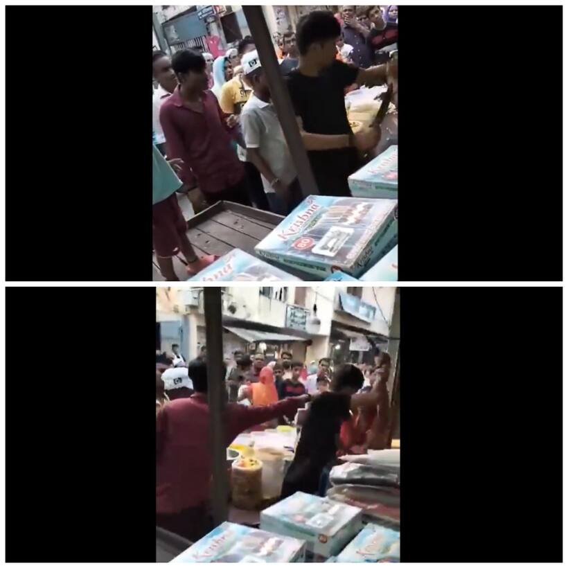 Delhi HORROR! Man brandishes knife, threatens to stab woman during argument as crowd watches (WATCH)