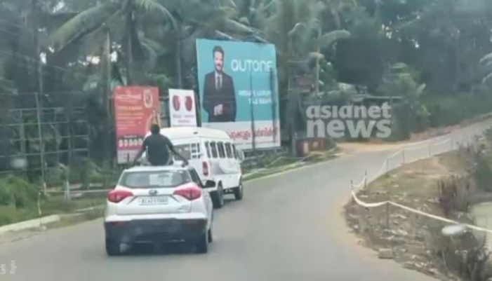 man found travelling by sitting on the top of a car while when coming back from Munnar