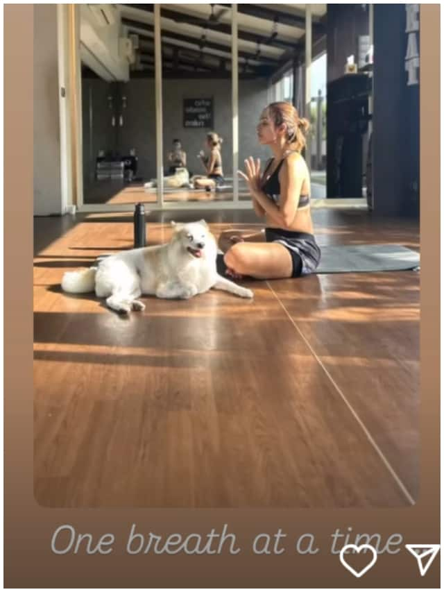 One breath at a time...', Malaika Arora shares photo of her doing Yoga with her pet dog ATG