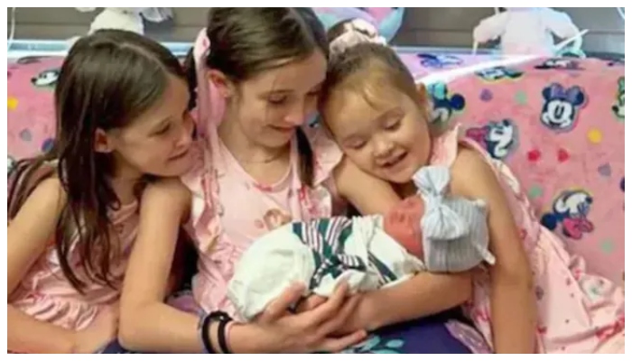 Mother gives birth to four daughters on the same day in 9 years