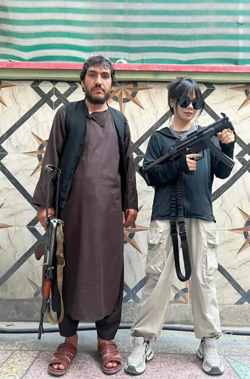 Chinese tourists pose with guns along with Taliban during Afghanistan visit; viral pics leave netizens stunned shk