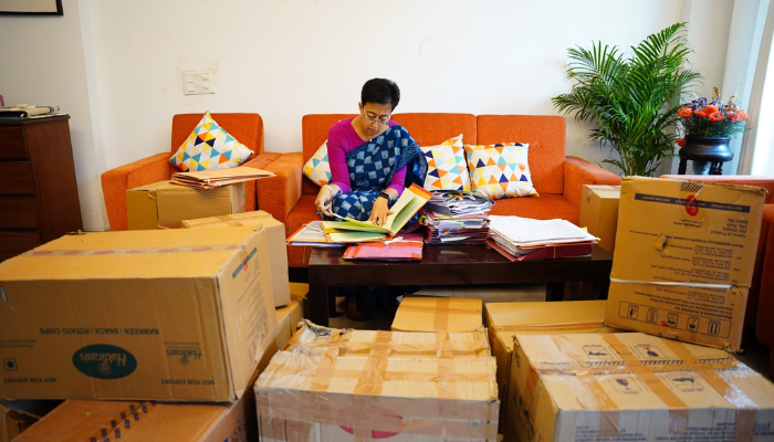 Delhi CM residence row: Atishi works amid packed cartons at her Kalkaji home; Check out viral photos gcw