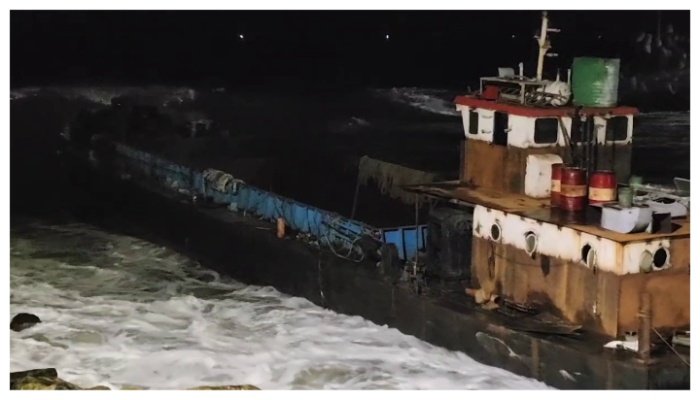 Later in the evening barge was caught  sea and crashed embankment