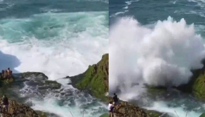 massive wave drags Indonesian man shocking video 