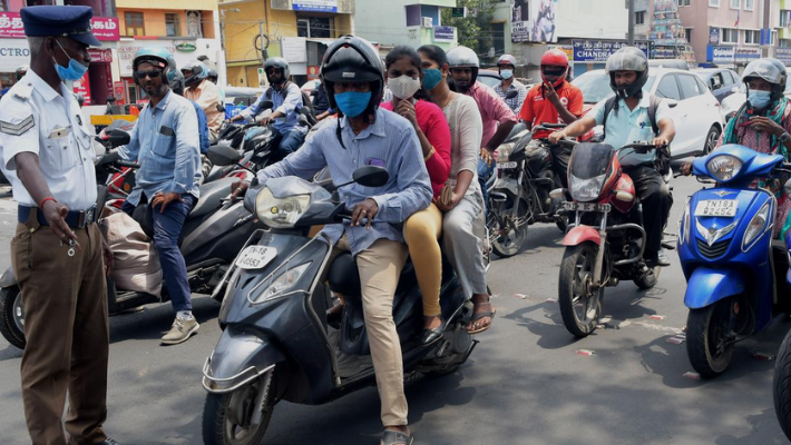 Wearing helmet without a proper strap can fetch you fines! Check details