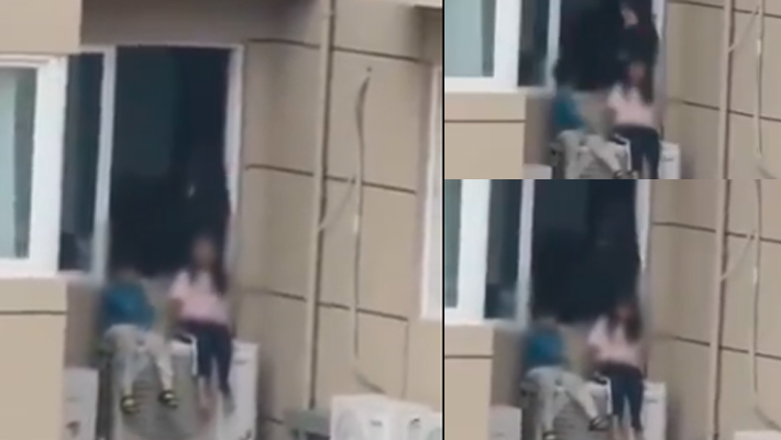 Woman in China puts kids out of 23rd floor window to frustrate husband; SHOCKING video goes viral (WATCH) AJR