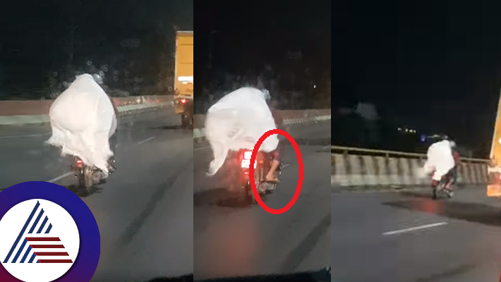 video of a person wearing white cloth seems life ghost sitting on the back of a bike has gone viral suc