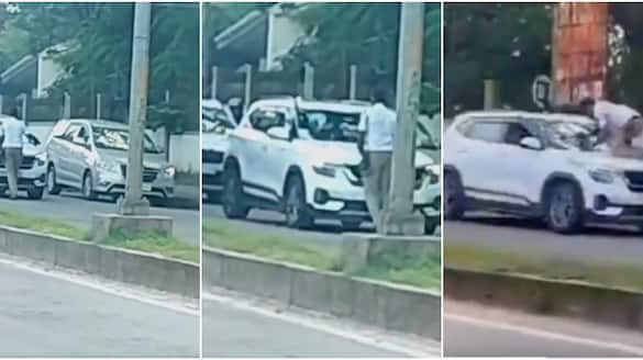 man drags traffic police for over 100 meters on car bonnet during traffic check