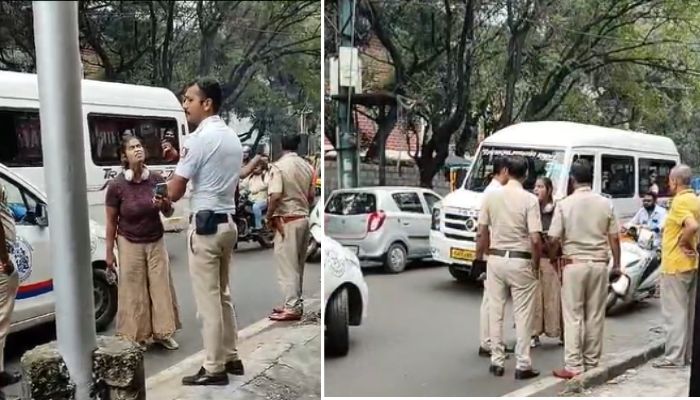 Bengaluru SHOCKER Enraged woman hurls abuses to traffic policeman in Hindi stamps cop foot WATCH vkp