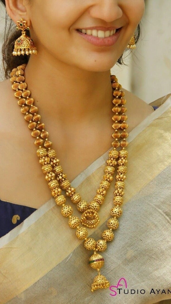 Check out the latest necklace designs with gold beads