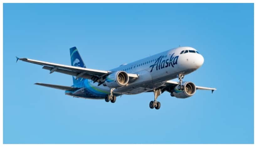 Alaska Airlines flight attendant caught on video punching man who attacked female passenger (WATCH)