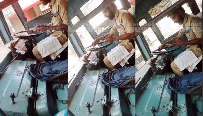 mvd suspended driving license of ksrtc driver who used mobile phone while driving the bus 