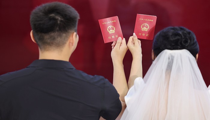 China's marriage registrations dip by almost a million in 2024 amid rising living costs & economic uncertainty shk