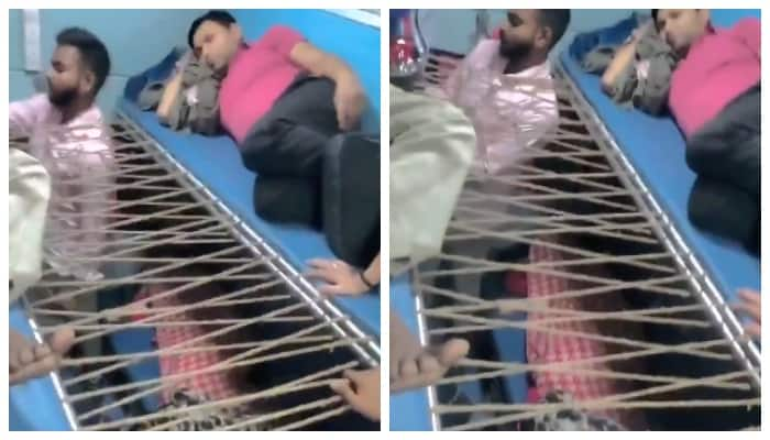 Video of passenger making his own seat between two berths of a train goes viral 