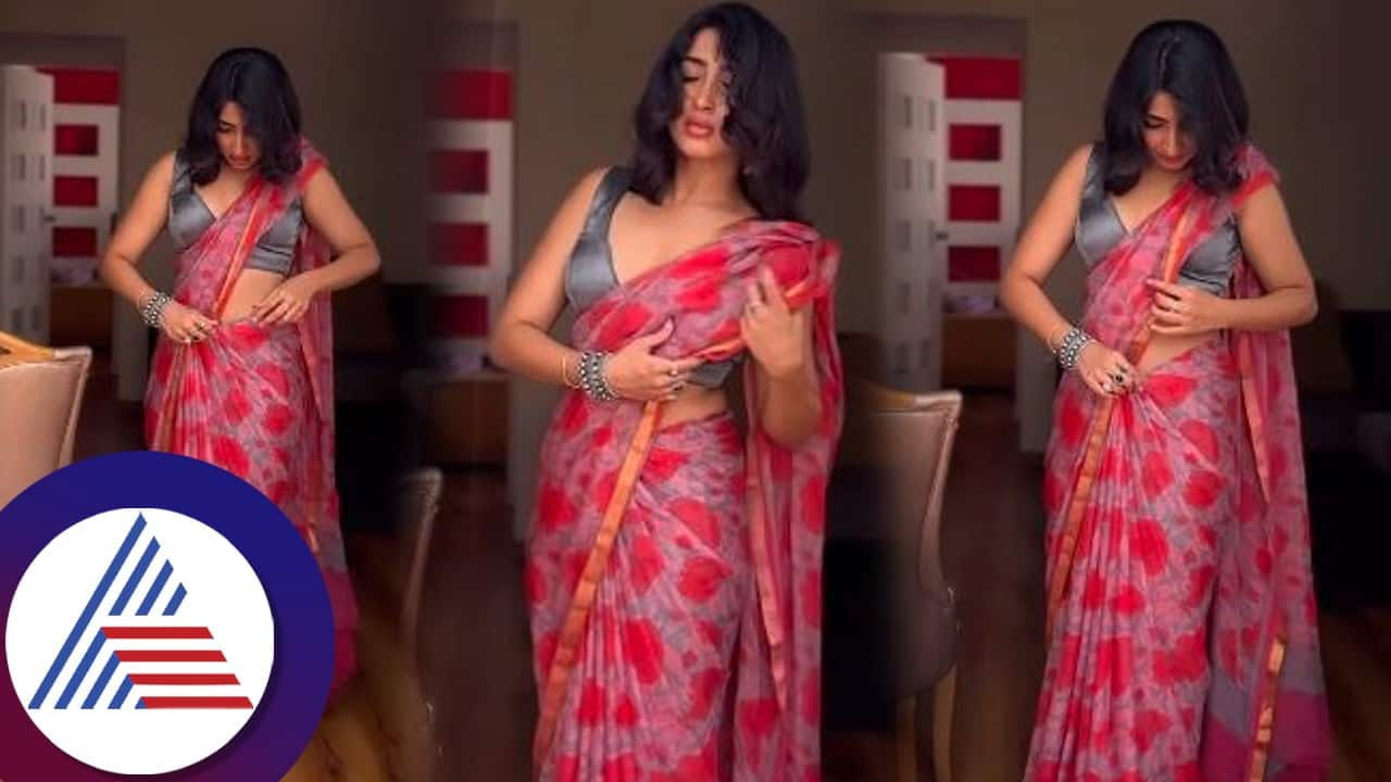 Saanya Iyer flaunts her red floral saree with sleeveless blouse vcs