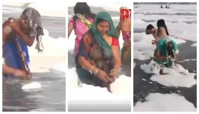 Social media warns women taking bath in Yamunas Toxic Foam