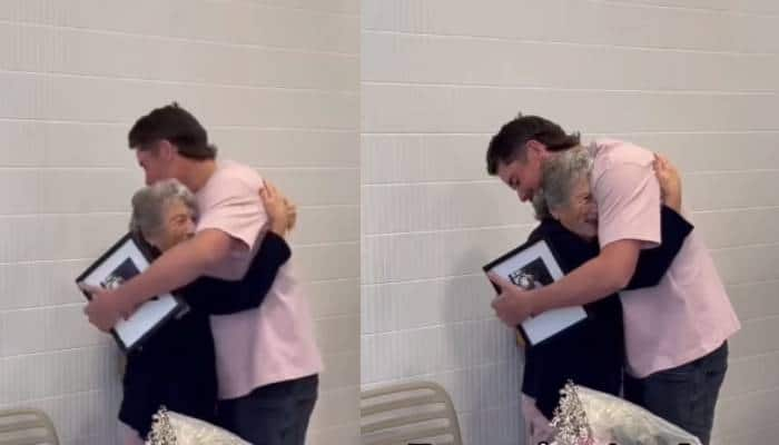 woman sitting alone in cafe on her late husbands birthday grandson surprises her 