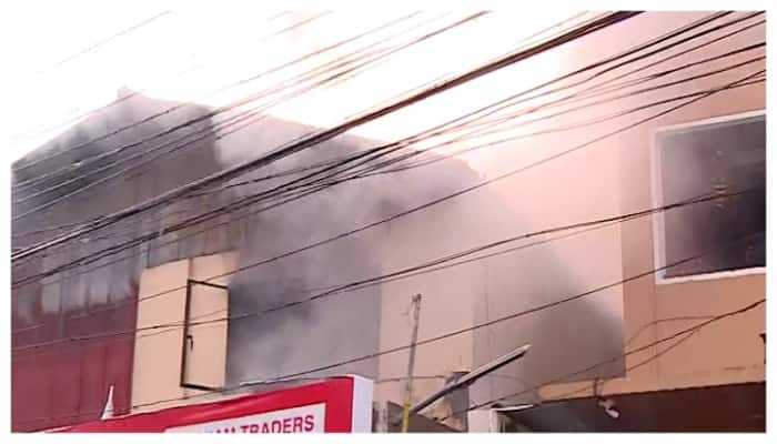 Fire breaks out at sanitary shop in Thiruvananthapuram employees ran down and the firemen came to the rescue