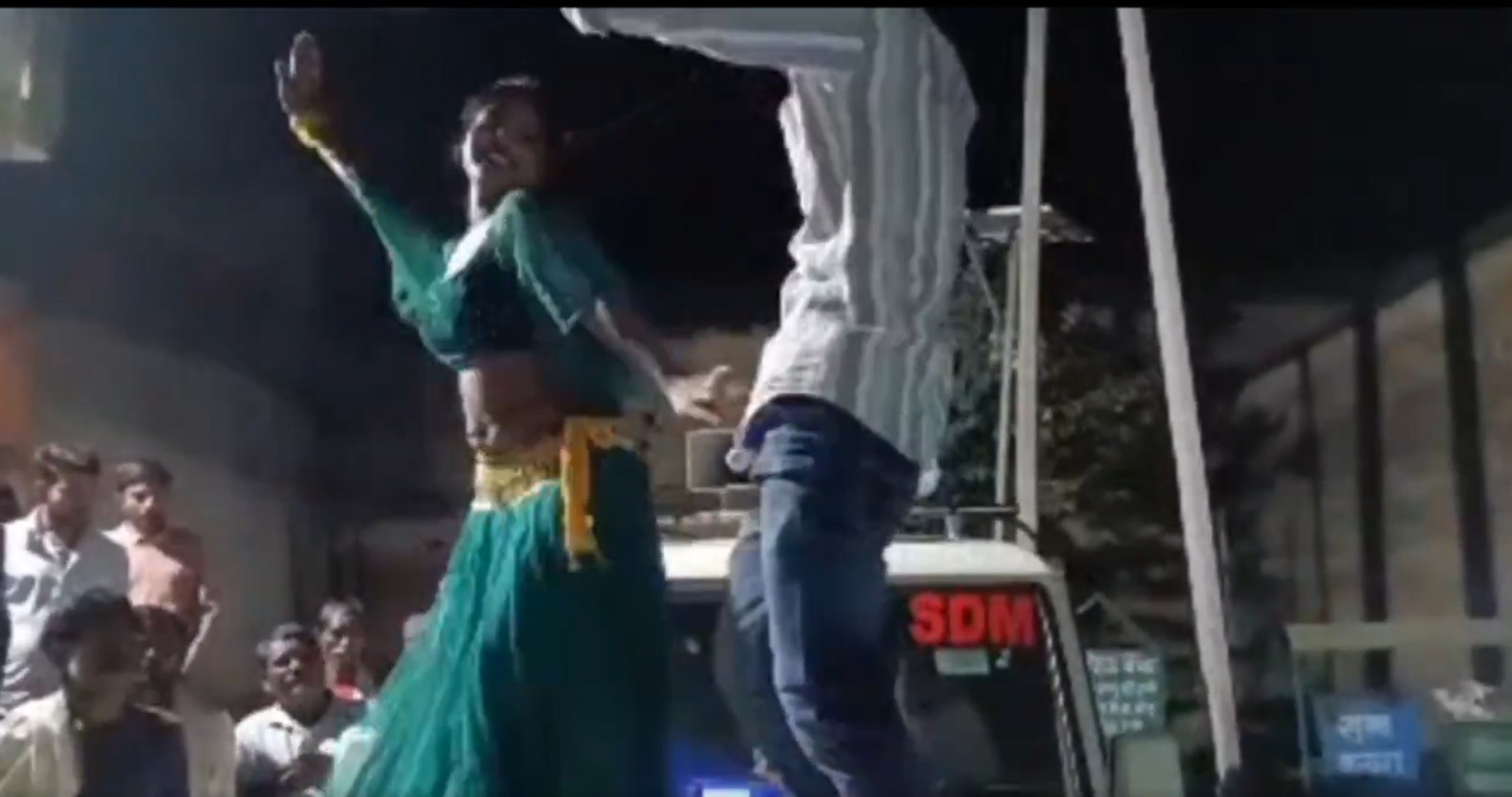 Woman's 'obscene' dance with man on bonnet of SDM's car in UP goes viral; FIR against driver (WATCH) shk