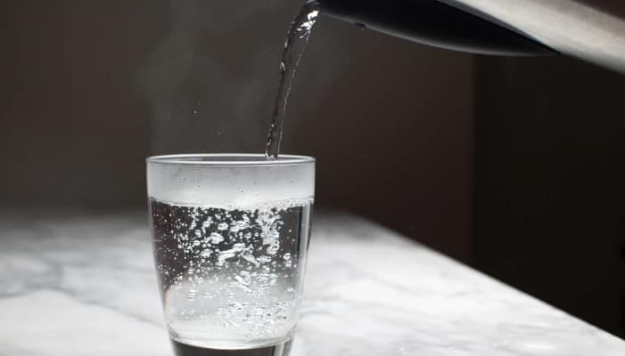 benefits of drinking warm water in empty stomach ans