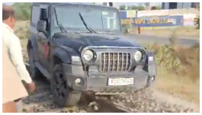 Video of man driving Mahindra Thar to railway track in an inebriated condition goes viral 