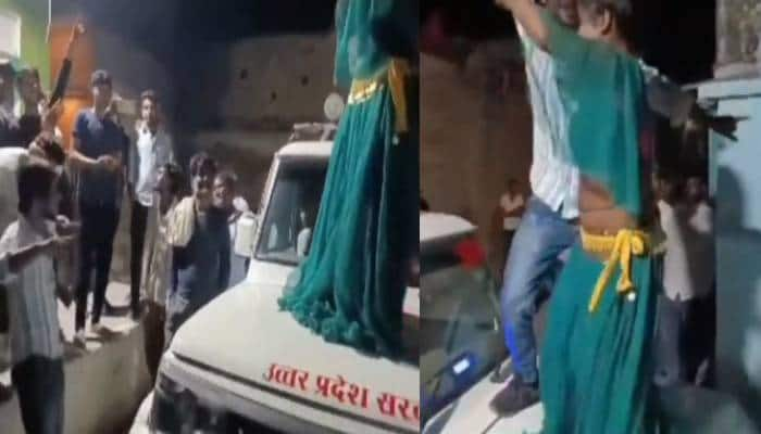 woman dancing on SDM cars bonnet in Jhansi video went viral 