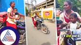 Rajkot Woman zomato agent delivering food with her child seated on front of her bike ckm