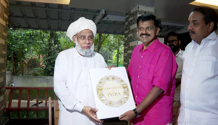 sandeep varier meets samastha president muhammad jifri muthukoya thangal in malappuram handed over Handwritten version of the Constitution