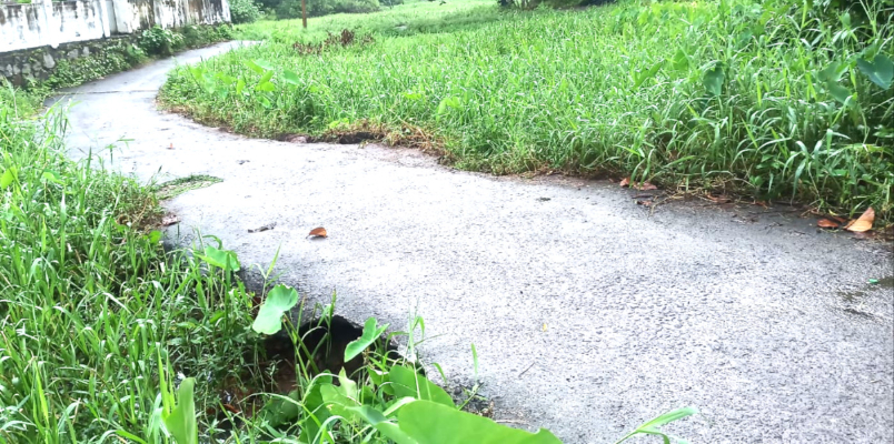 concrete road caved in danger condition in Kumarapuram