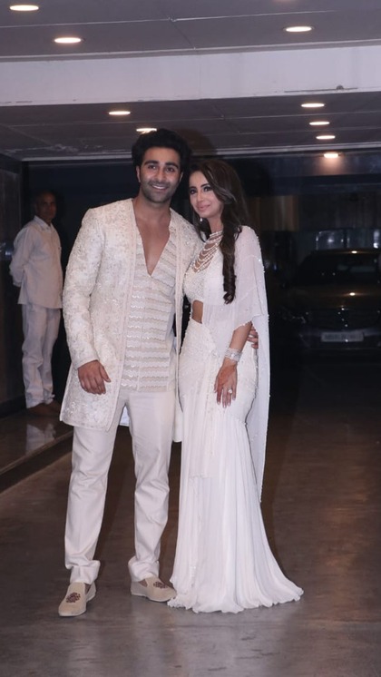 Aadar and Aalekha chose white outfits for their roka ceremony.