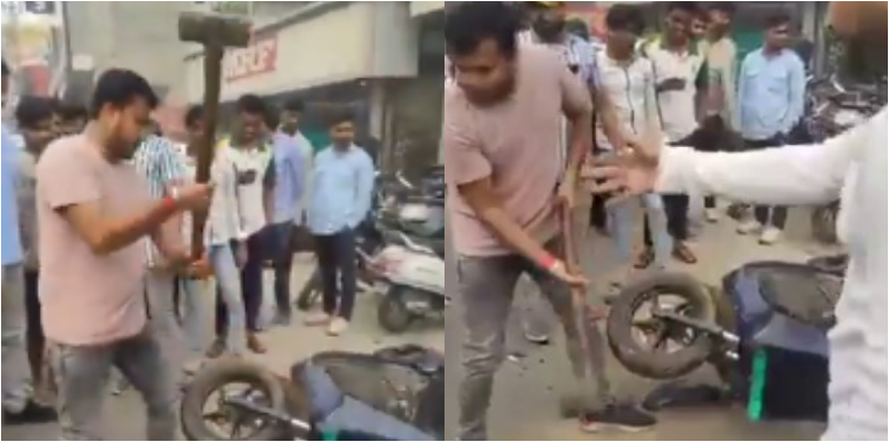 video of a man smashed an Ola scooter with a hammer outside the showroom goes viral 