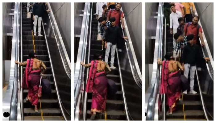 video of a woman trying to climb up on a descending escalator has gone viral