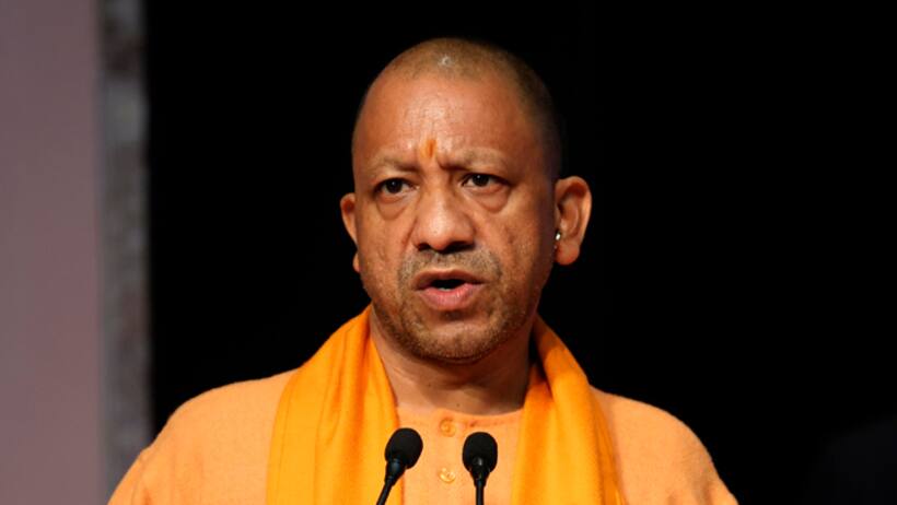 CM Yogi Adityanath  pays tribute to Constitution makers honors students at Lok Bhavan ceremony on constitution day of india