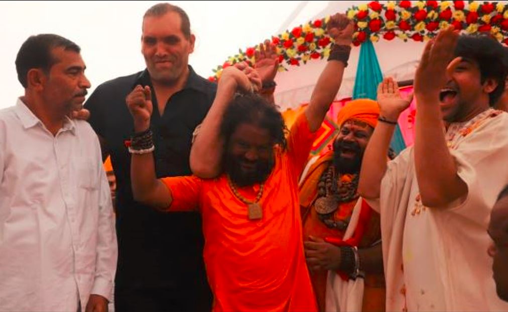 Wrestler The Great Khali lifting a monk by his hair Video viral