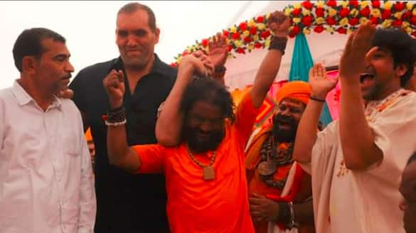 Wrestler The Great Khali lifting a monk by his hair Video viral