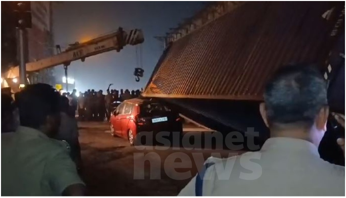 Accident in Kochi container fell on top of car