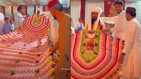 Viral video: Pakistani man wears 35-foot cash garland worth 1 lakh PKR on wedding day (WATCH) gcw