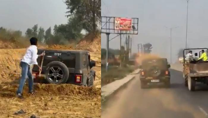 soil on roof man drives Thar SUV in busy road shocking video